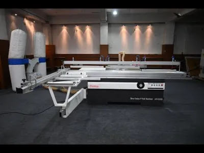 Industrial panel saw machine cutting laminated boards at Wudiqa factory