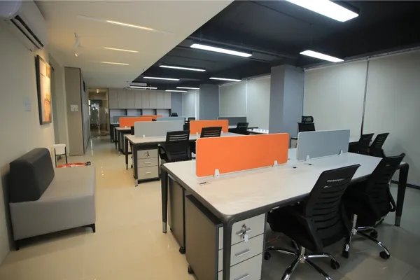 Modern office workstation setup with partitions and ergonomic furniture by Wudiqa